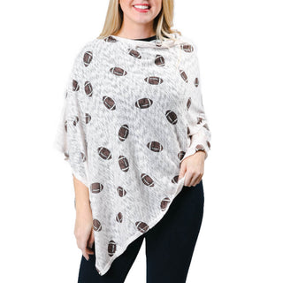 Emily poncho with footballs printed on cream