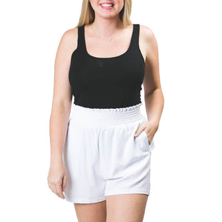 White colored loose shorts with high-waisted stretchy elastic waistband 