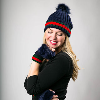 Navy Taryn knit fingerless glove with faux fur trim at fingers and green and red trim at cuff and matching hat
