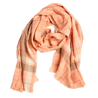Orange plaid with white and gray scarf.