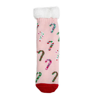 Slipper sock with multi-colored candy canes on light pink background.