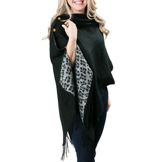 solid black poncho wrap with buttons that reverses to gray leopard